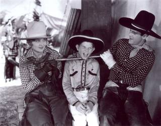 Jack Hanlon, center, in The Wagon Master (1930) with Gladys McConnell and Ken Maynard.